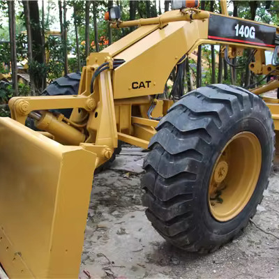 Grader originale per motori a ruote CAT 140K con basse ore di lavoro e motore Cummins